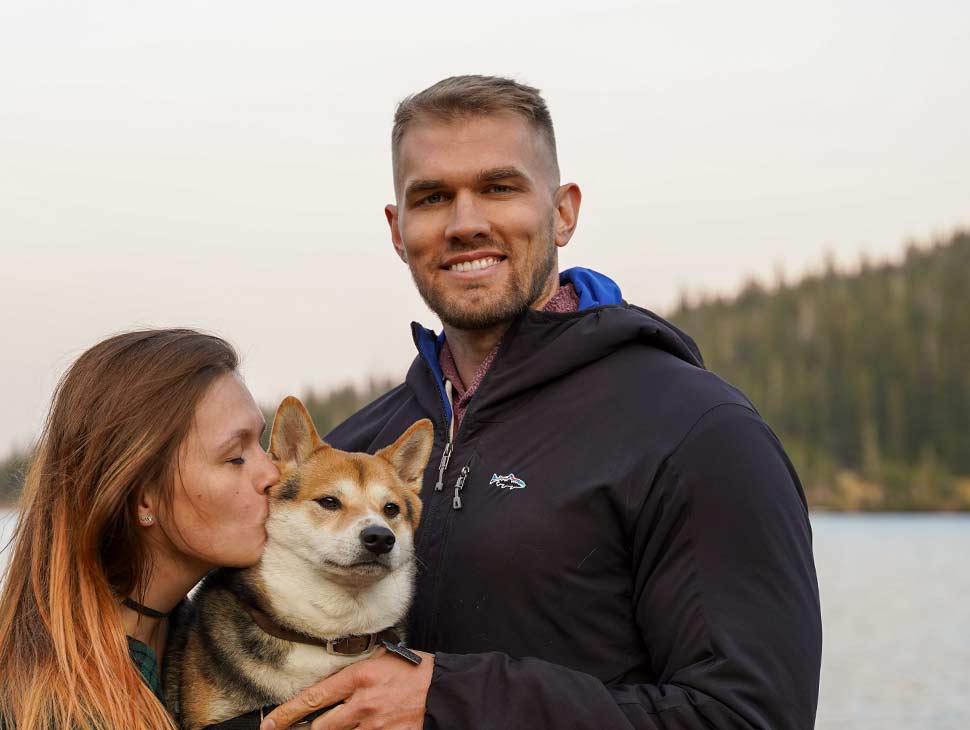 Dr. Zachary Kammer, dog Riku, and his wife