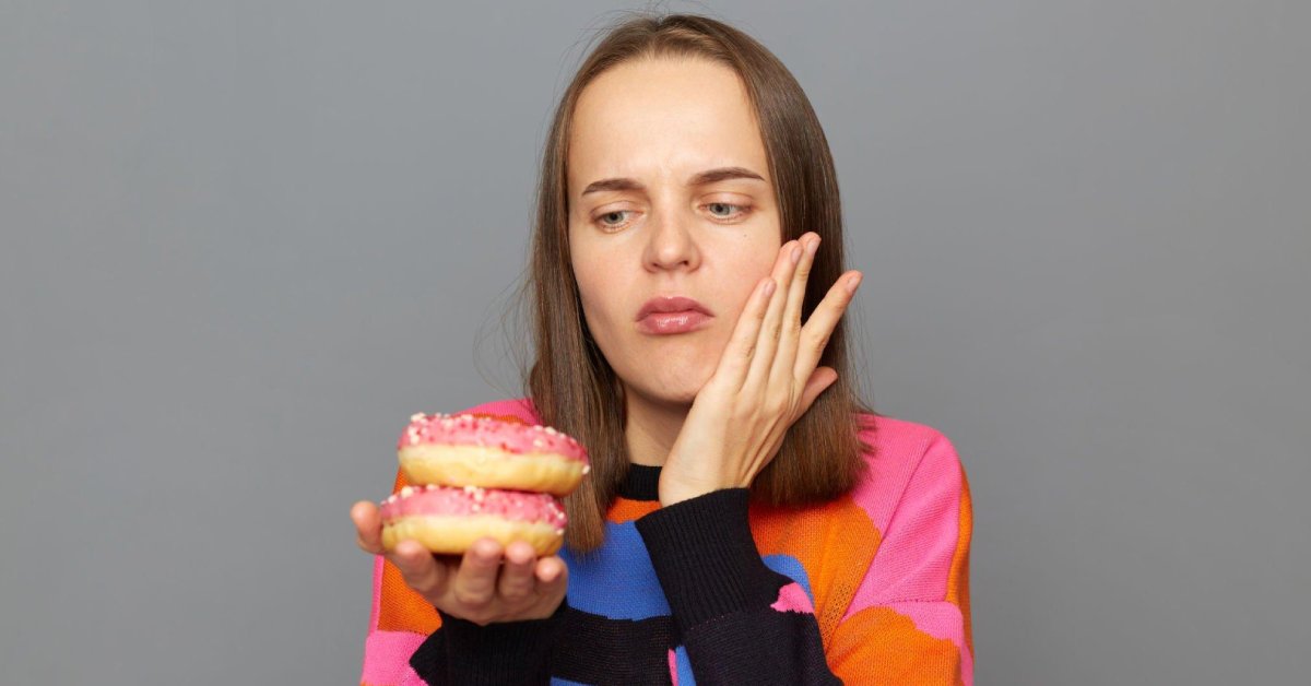 Woman staring at sweet foods